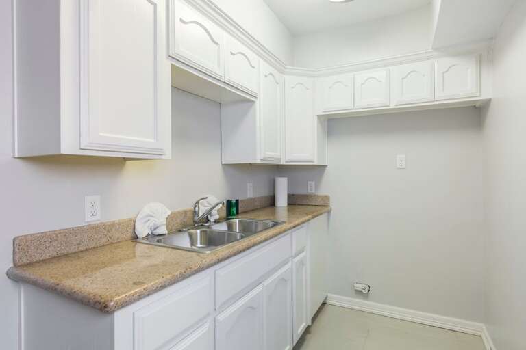 Kitchenette featured in the mother-in-law suite.