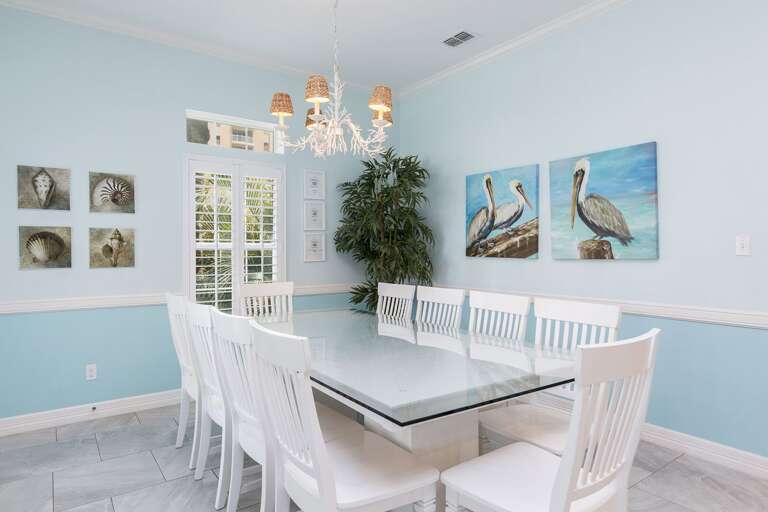 Beautiful dining room with large table (accommodates 10 guests. Additional seating at the bar & plenty of outdoor dining space as well! Beautiful dining room with large table (accommodates 10 guests. Additional seating at the bar & plenty of outdoor dining space as well!