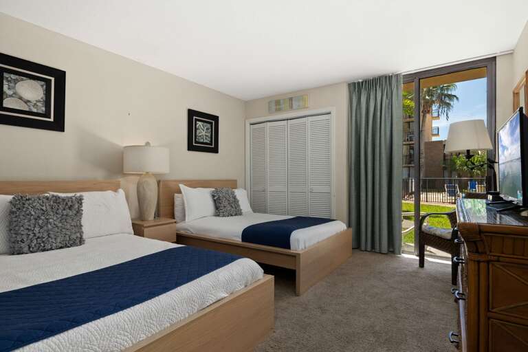 Enjoy a relaxing space with easy access to the patio and pool area.