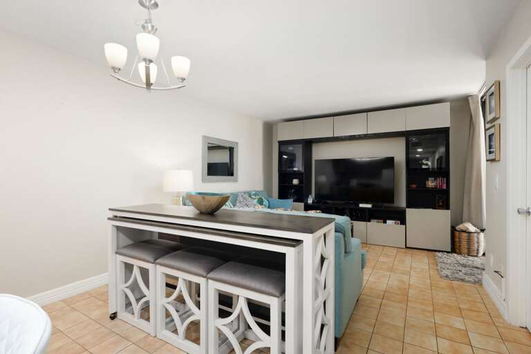 Spacious newly renovated living area featuring a large flat screen TV!