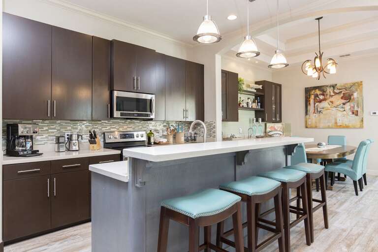 Fully stocked kitchen with all pots, pans, and cooking utensils!