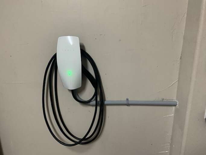 Tesla charger located in garage