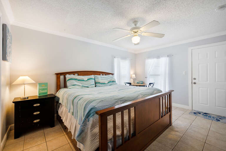 2nd Master Bedroom with King size bed, flat screen TV and private bathroom. This room also has private access to the pool. (Ground Floor)