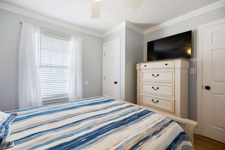 Bedroom #4 features a flat screen TV. (3rd Floor)