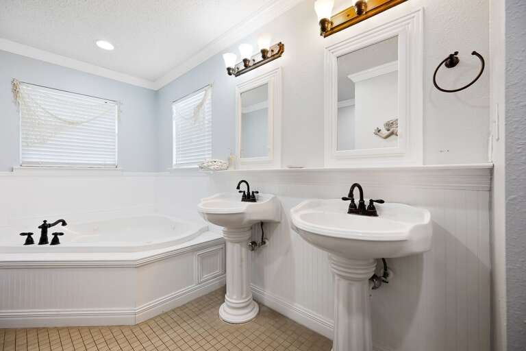 Master bathroom with oversized soaking bathtub, double sink and vanity, and shower. (3rd Floor)