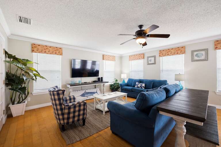 Spacious Living Room surrounding flat screen TV to enjoy movie nights! (2nd Floor)
