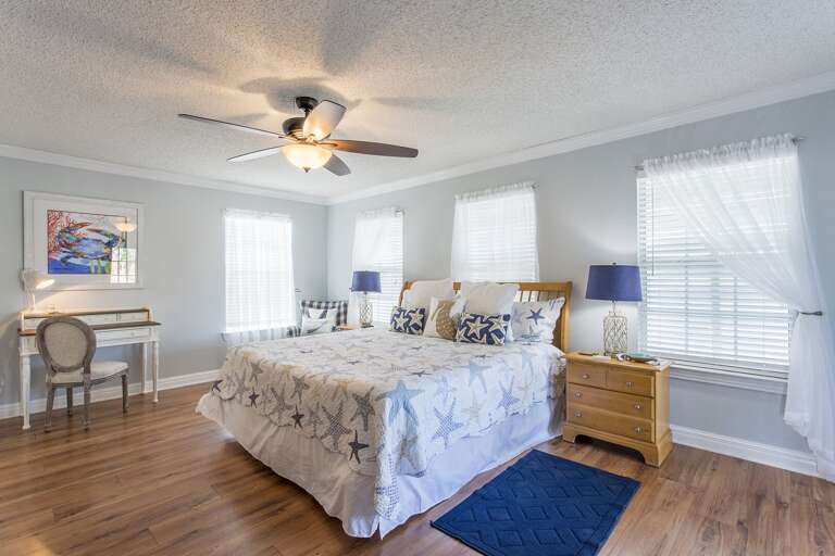 Spacious Master Bedroom with King bed, flat screen TV, master bathroom and private balcony. (3rd Floor)