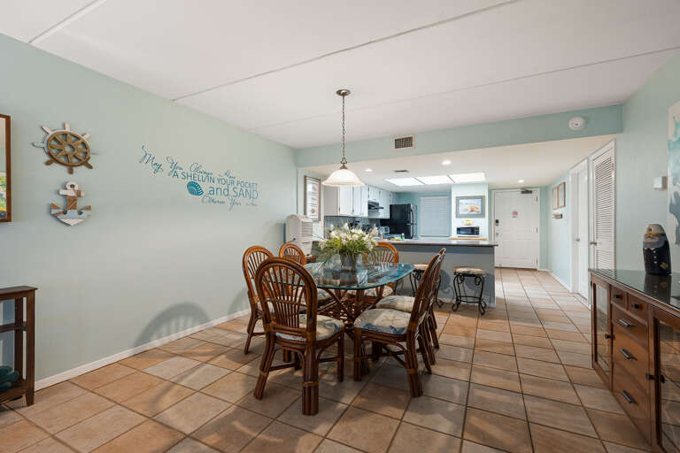 Dining Table accommodates 6