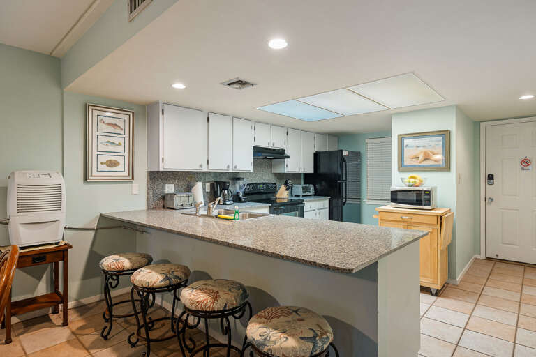 Extra bar seating for four guests included!