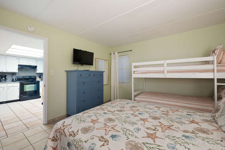 Guest Bedroom features twin bunk beds and a full size bed