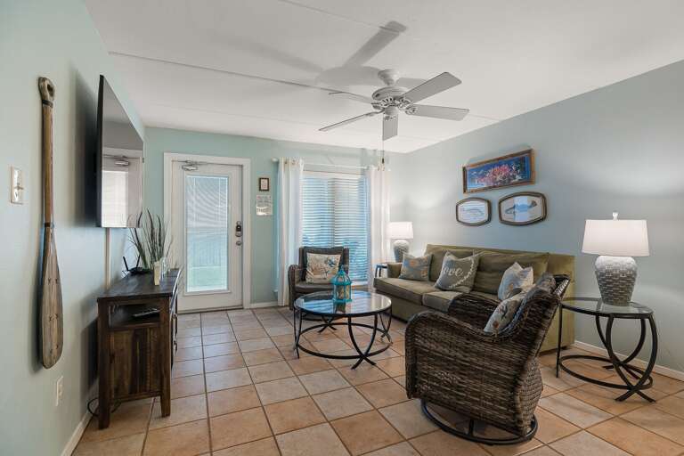 Living Room with direct patio access facing the beach!