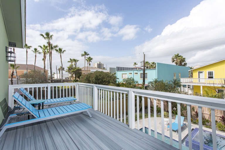 Bask under the sun on the second floor balcony. The balcony is accessed via 2nd or 3rd bedrooms.