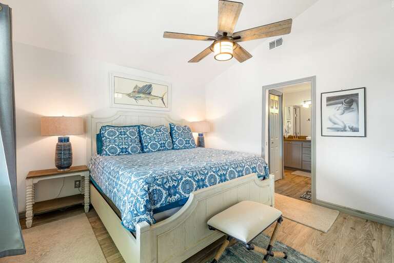 First bedroom with King size bed and private bathroom.