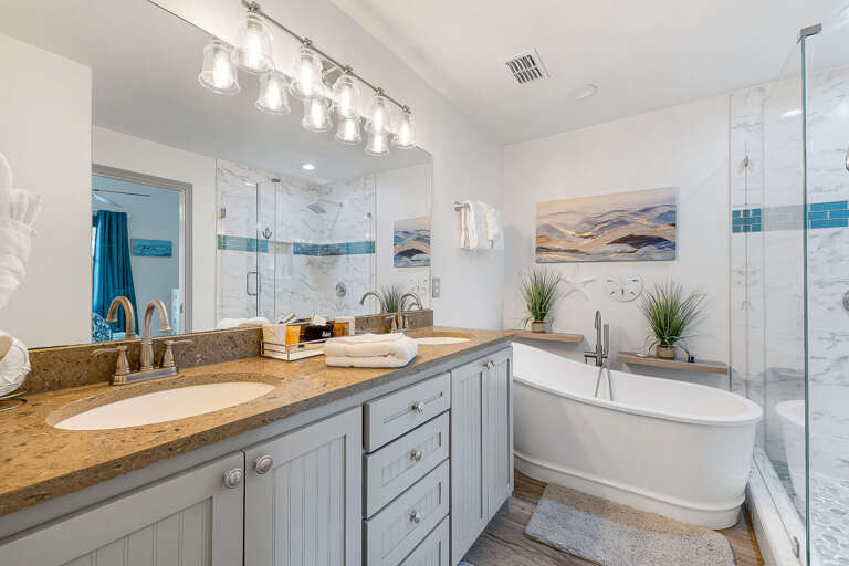 Large double vanity and bright vanity lighting.
