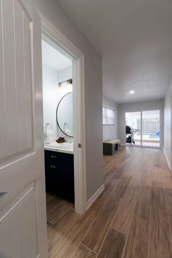 Half bathroom located on the ground floor and next to the patio with private pool!