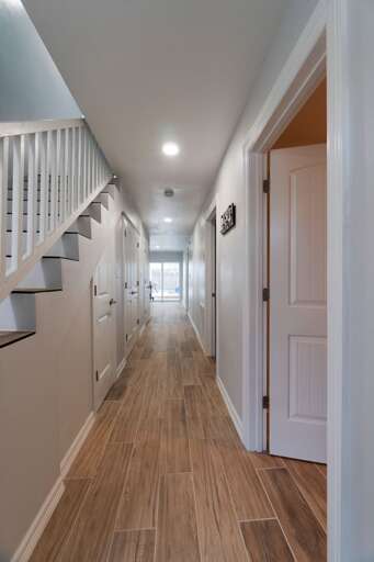 Front interior off entrance. The ground floor has one guest bedroom & attached bathroom, a half bathroom (conveniently off the pool area), laundry closet, and the Master bedroom & bathroom.