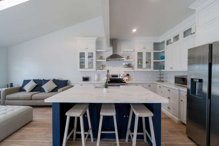 Gorgeous modern kitchen with stainless steel appliances.