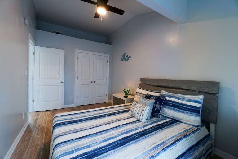 Guest bedroom on the 2nd floor with a Queen size bed. (1 of 4 total bedrooms).