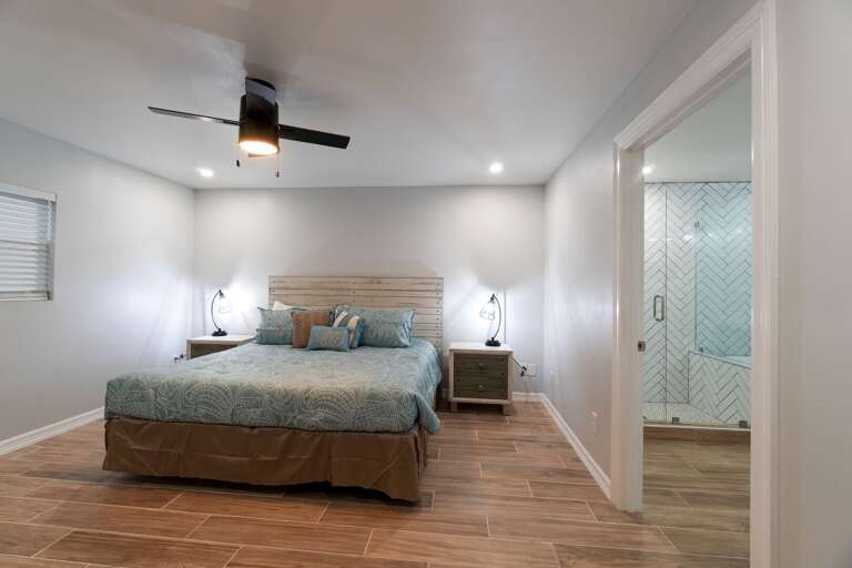 Large master bedroom with King bed and flat screen TV, as well as a private master bathroom!