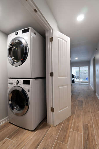 Laundry closet with washer & dryer. Located on ground floor.
