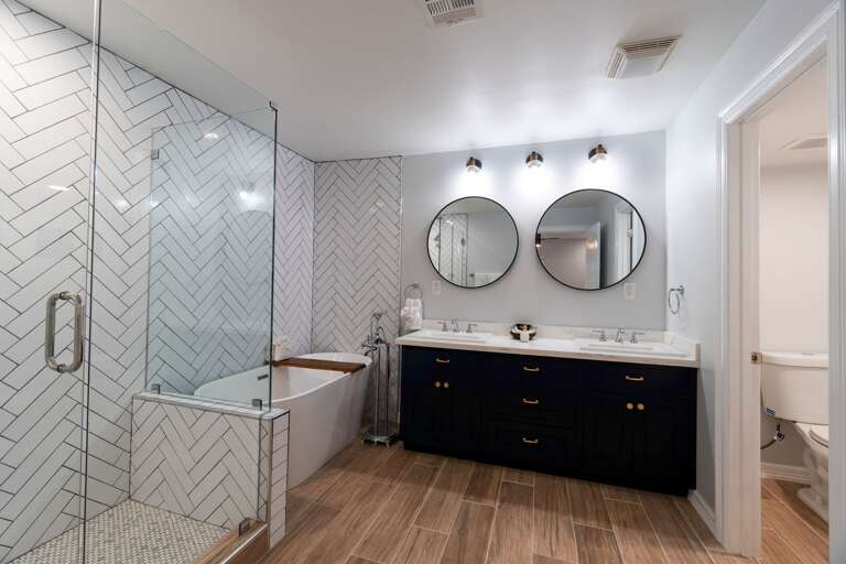 Stunning master bathroom with double vanity, walk-in shower and gorgeous soaking tub!