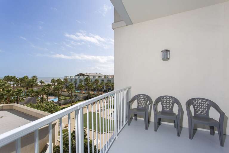 Beach facing balcony provides side views of the ocean and the resorts beautiful tropical grounds.