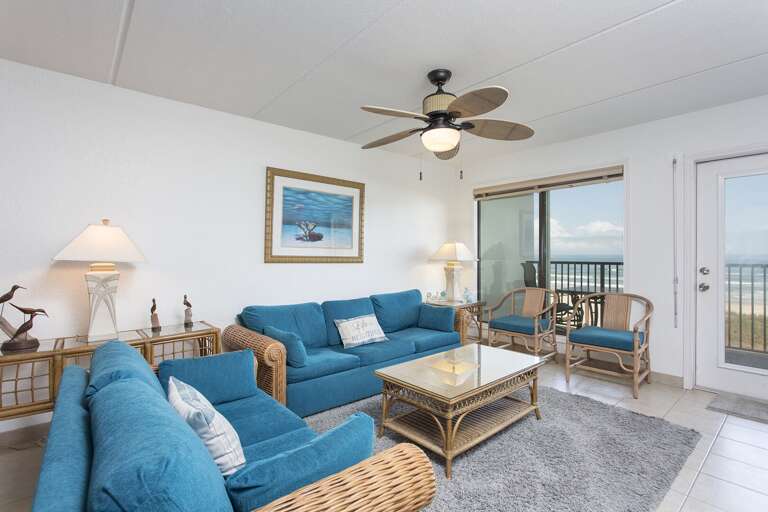 Enjoy the coastal charm of your living area overlooking the beach! Enjoy the coastal charm of your living area overlooking the beach!