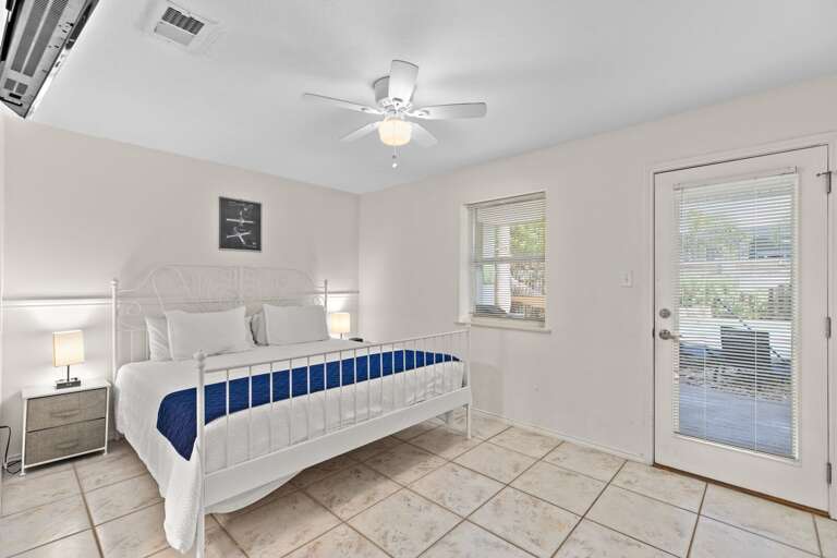 Guest Bedroom Features a King Bed with direct pool access!