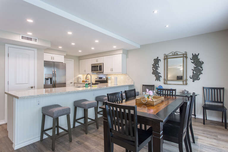 Kitchen and dining area with long bar