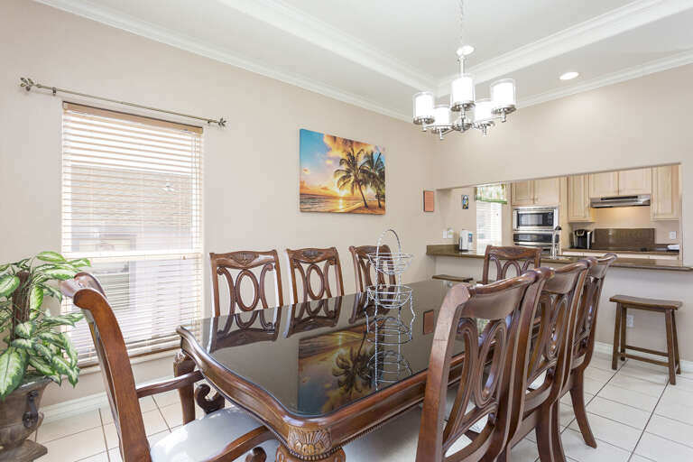 Dining table accommodates 8 with additional bar seating for 4.