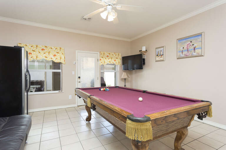 Game room with flat screen TV and pool table!