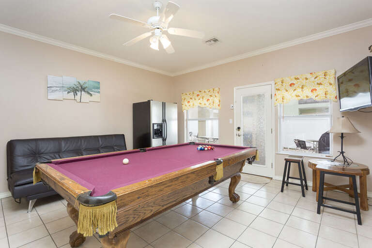 Game room with flat screen TV and pool table!
