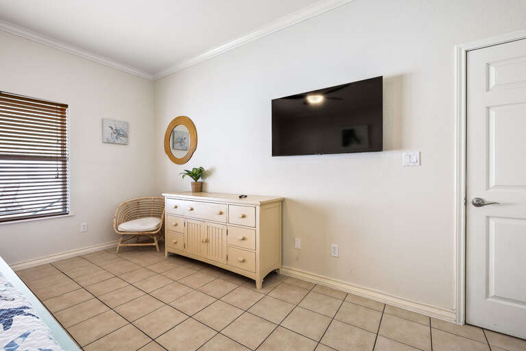 Guest bedroom with King bed and flat screen TV