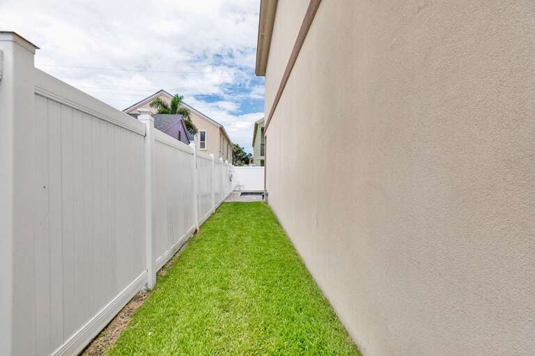 Nice grassy area on the side of the house