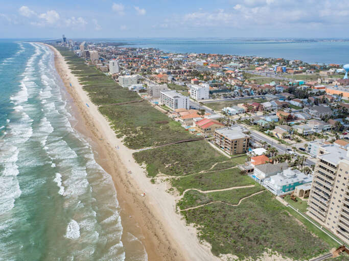 Bird's eye view of the complex showing its close proximity to the beach. Bird's eye view of the complex showing its close proximity to the beach.