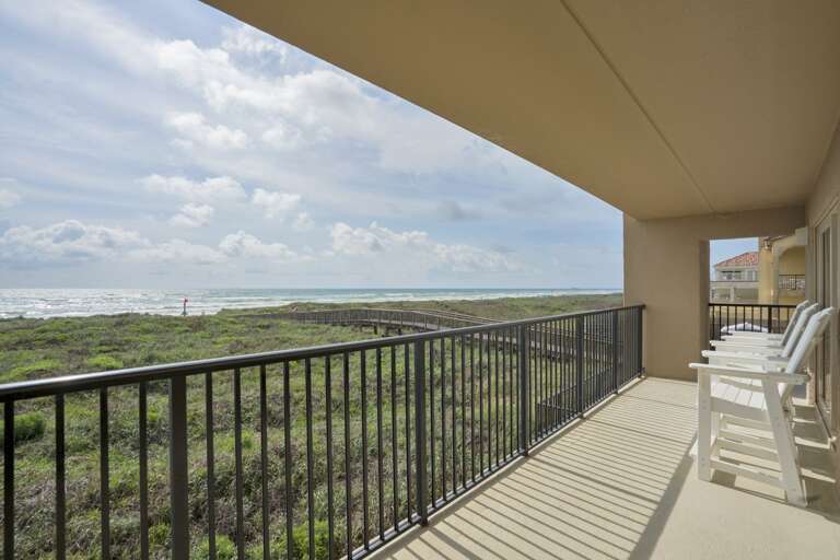 Seating for guests to sit and enjoy the balcony views. Seating for guests to sit and enjoy the balcony views.