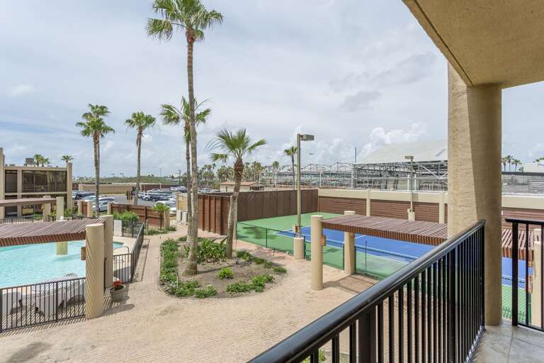 Balcony view towards the pool and tennis courts!