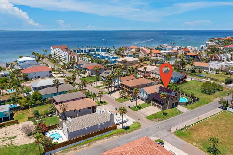 Aerial of the house and the bay. Aerial of the house and the bay.