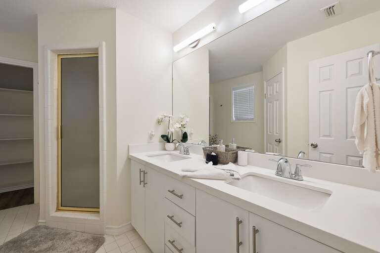 Attached bathroom in the Master bedroom. The closet in this bathroom has access to another bonus space that has 4 Twin beds. Attached bathroom in the Master bedroom. The closet in this bathroom has access to another bonus space that has 4 Twin beds.
