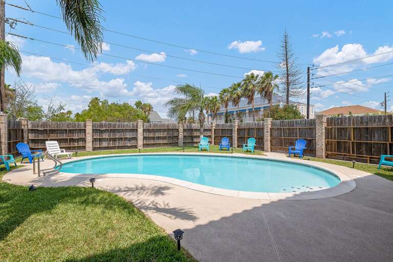 Beautiful pool area with privacy fence & lots of sun!