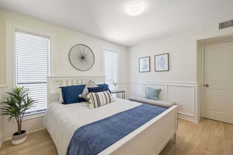 Guest bedroom with Queen Bed. Located on 2nd floor near living room.