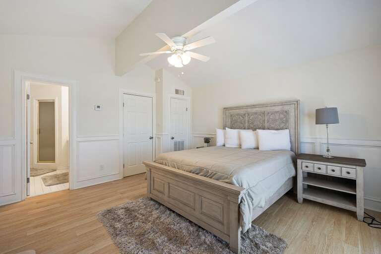 Master bedroom on 3rd floor with  attached bathroom. There is a bonus room with 4 twin beds located through the master bathroom. Master bedroom on 3rd floor with  attached bathroom. There is a bonus room with 4 twin beds located through the master bathroom.