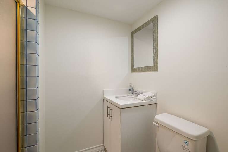 Shared full bathroom with shower, outside the 4th guest bedroom and located next to the entryway & pool. Shared full bathroom with shower, outside the 4th guest bedroom and located next to the entryway & pool.