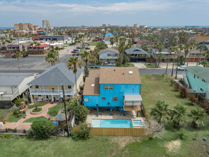 Aerial view of the backyard and pool area.