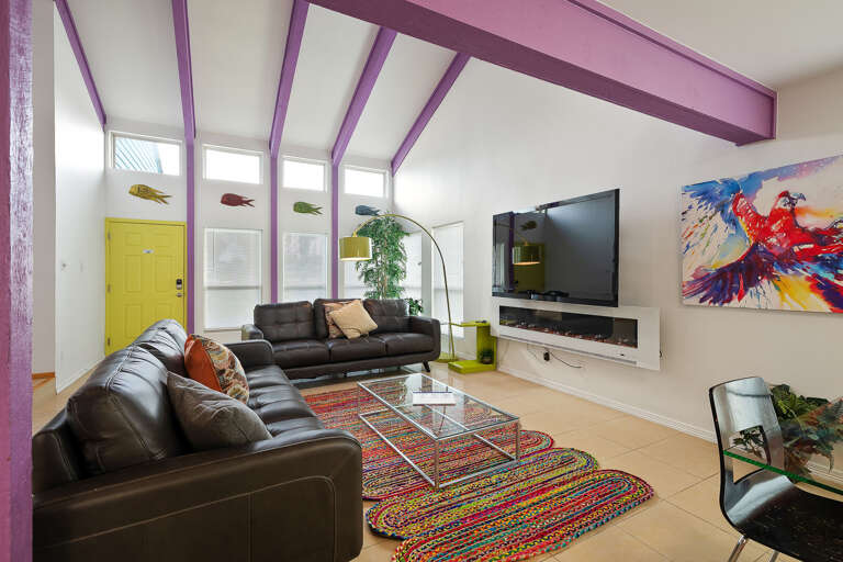 Great living area with large flat screen tv and electric fireplace!