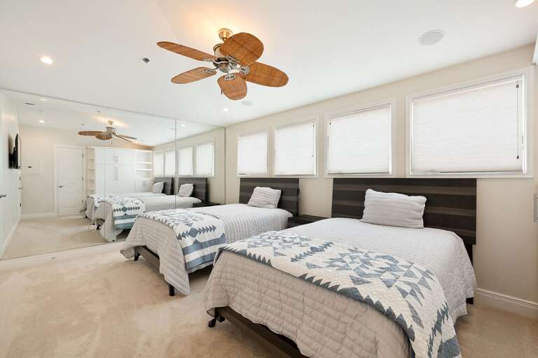 Bedroom 3 (2 Full beds). Located on the top floor. Bedroom 3 (2 Full beds). Located on the top floor.