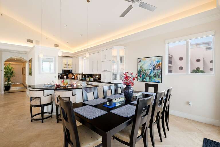 Dining area has seating for 8, with 2 additional seats at the bar. Dining area has seating for 8, with 2 additional seats at the bar.