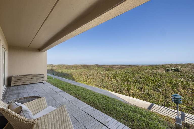 Spacious oceanfront balcony with plenty of room to relax and enjoy the ocean breeze and sound of the waves!