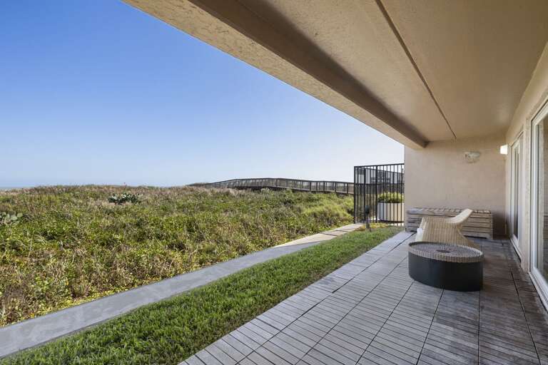 Spacious oceanfront balcony with plenty of room to relax and enjoy the ocean breeze and sound of the waves!