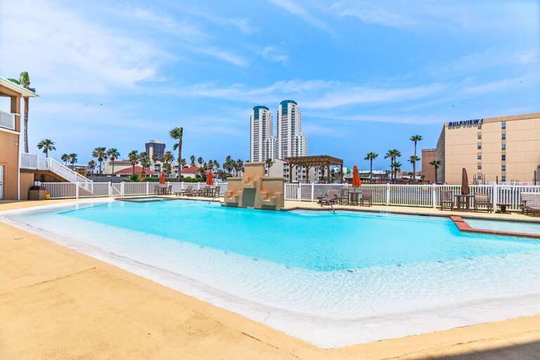 Soak up the sun in the gorgeous community pool area after a day at the beach!